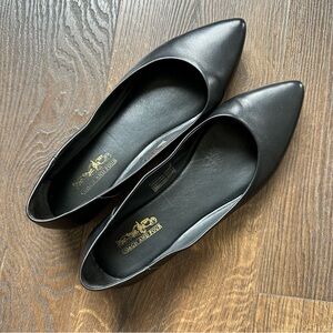 Coach and four black leather flats